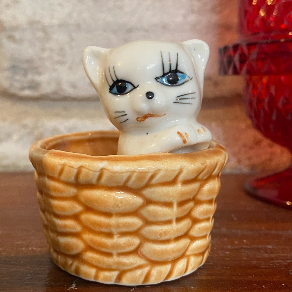 Vintage kitschy kitten in a wicker basket figurine, kitty cat knick knack